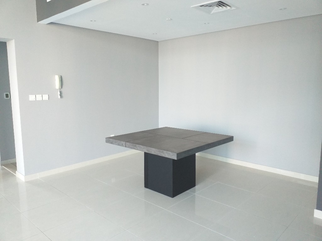 Before — empty dining room with square table
